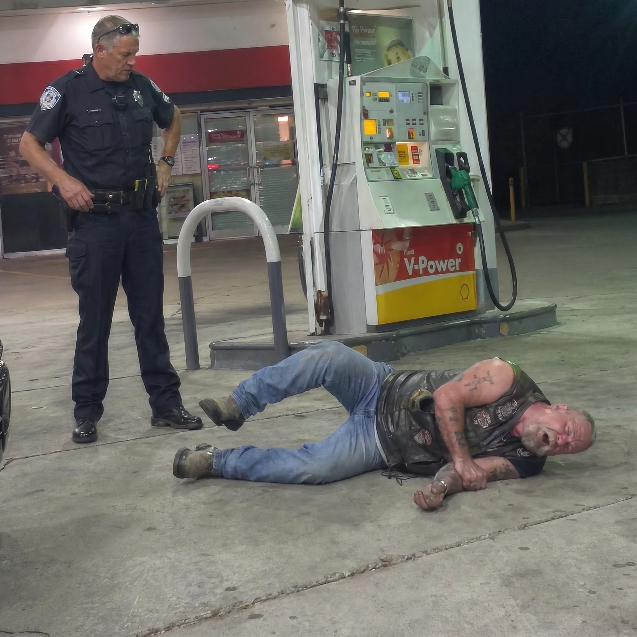 Biker Collapsed in Front of My Store Shaking and Cops Told Me to Leave Him There